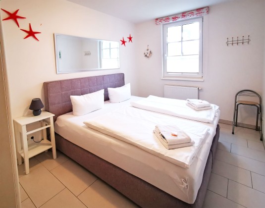 Schlafzimmer Ferienwohnung Sanddornstübchen mit Meerblick Ref. 128662-T