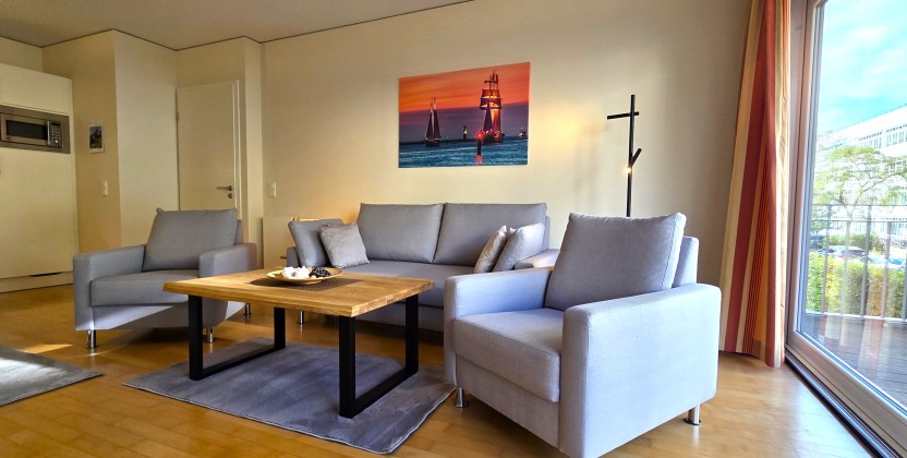 Ferienwohnung Koralle - Wohnzimmer / Balkonzugang